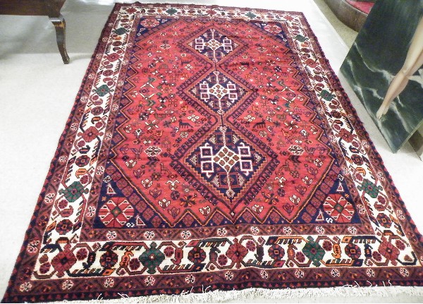 Appraisal: PERSIAN SHIRAZ CARPET Fars province south central Iran centering three