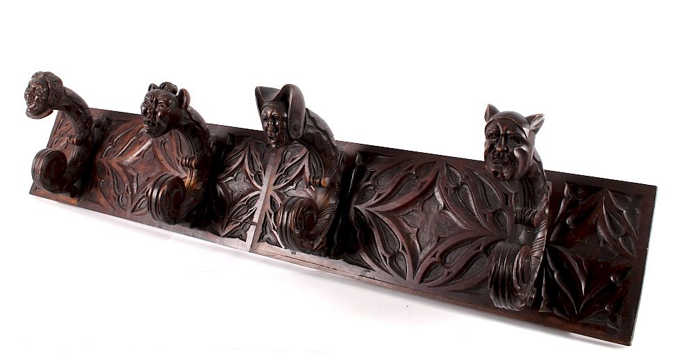 Appraisal: th Century Black Forest Carved Figural Hanger Included in this