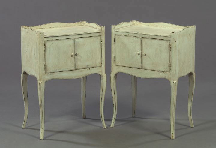 Appraisal: Pair of French Provincial Paint-Decorated and Distressed Wooden Bedside Cupboards