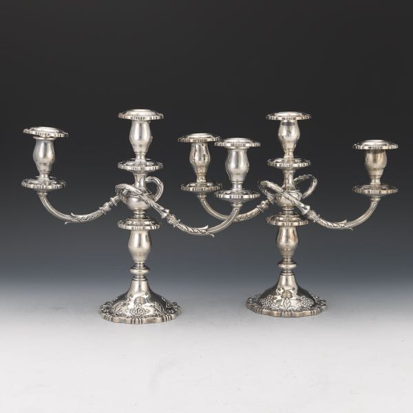 Appraisal: FISHER PAIR OF STERLING SILVER THREE-LIGHT CANDELABRA ENGLISH ROSE PATTERN