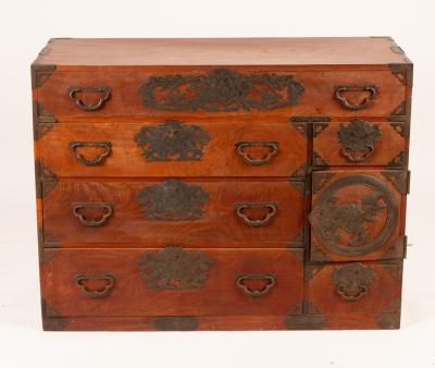 Appraisal: A Korean elm chest of seven various drawers with engraved