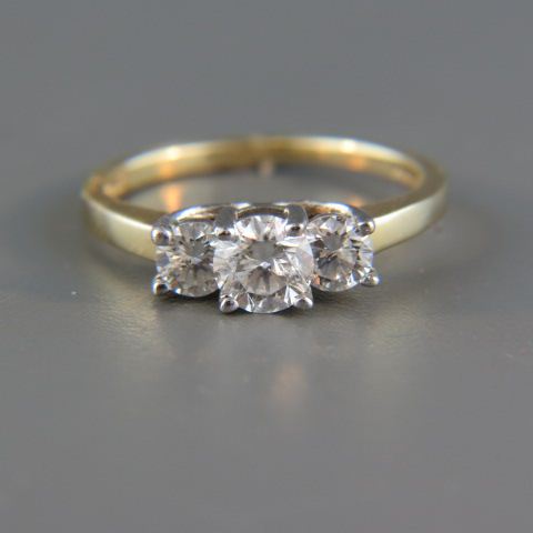 Appraisal: Diamond Ring a trio of round brilliant cut diamonds totaling