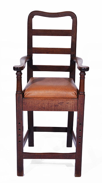 Appraisal: A TH CENTURY MAHOGANY CHILD'S HIGH CHAIR with ladder back