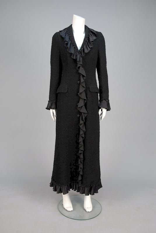 Appraisal: MOSCHINO CHEAP and CHIC BOUCLE DRESS COAT Full length black