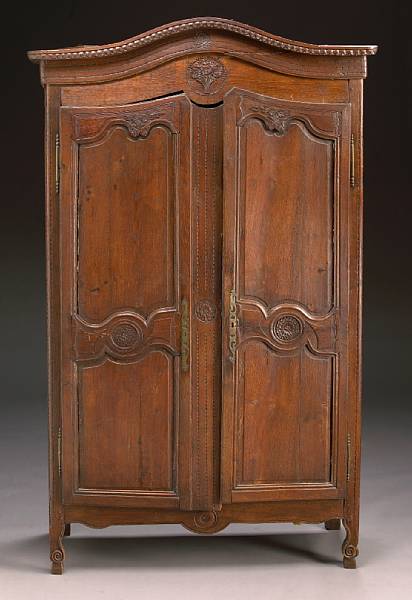 Appraisal: A Louis XV Provincial carved oak armoire second half th