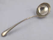 Appraisal: A silver Old English bead pattern soup ladle by the