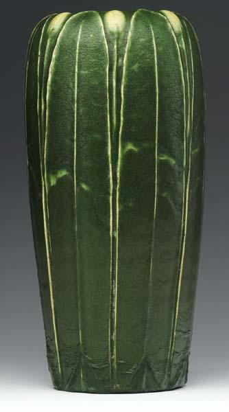 Appraisal: GRUEBY Tall ovoid vase with tooled and applied full-height leaves