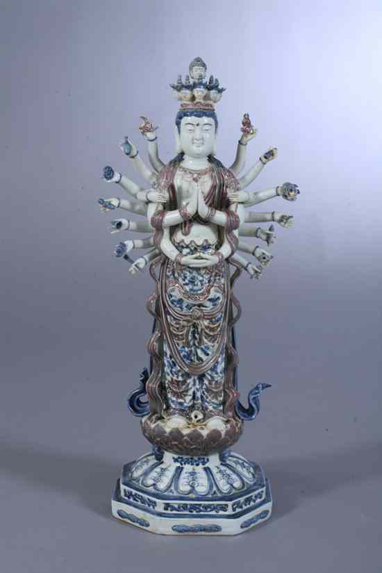 Appraisal: CHINESE COPPER RED AND BLUE PORCELAIN FIGURE OF DEITY Standing