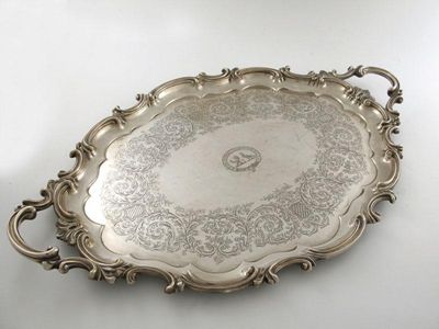 Appraisal: A th century electroplated two handled tray shaped outline with