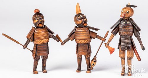 Appraisal: THREE KOBE SAMURAI FIGURESThree Kobe Samurai figures intricately carved and