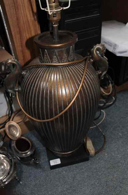 Appraisal: A BRONZED TABLE LAMP of inverted baluster form in the