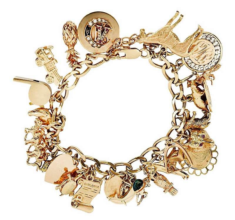 Appraisal: Gold Charm Bracelet charms including pineapple fire truck horses elephants