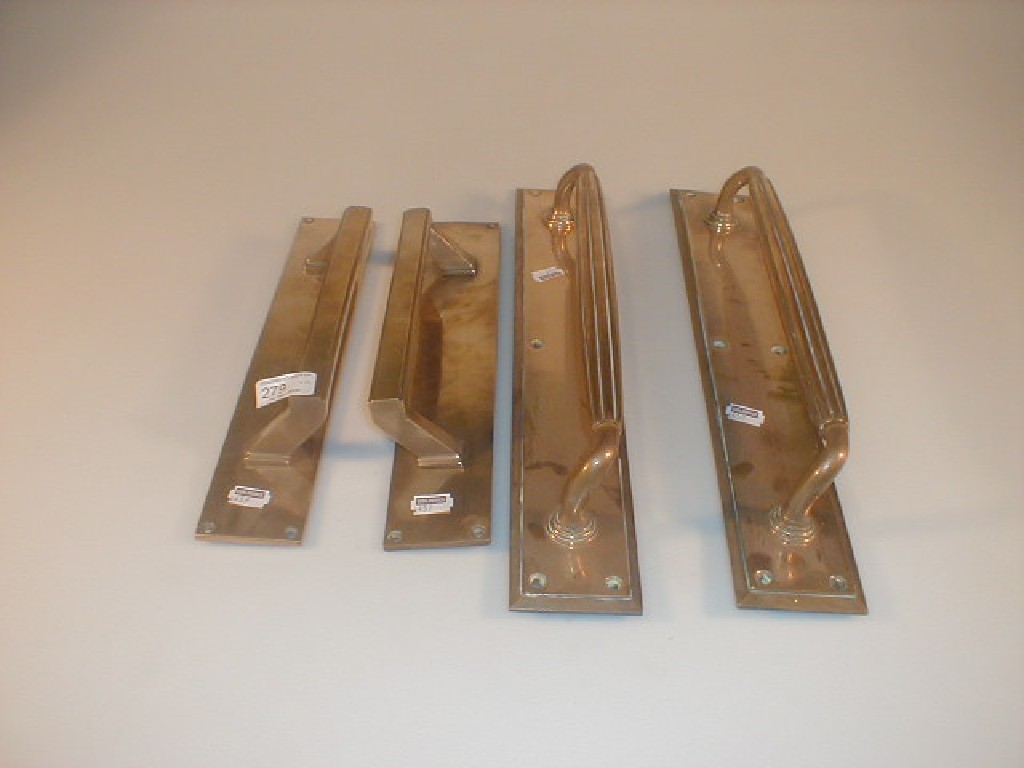 Appraisal: Two pairs of brass door handles with rectangular back plates