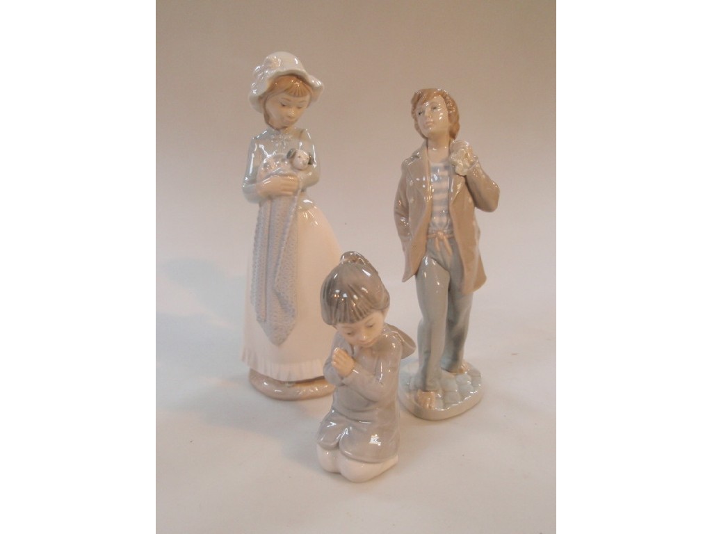 Appraisal: Three Nao porcelain figures