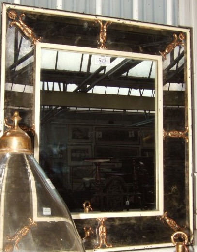 Appraisal: A rectangular wall mirror with an aged mirror surround with