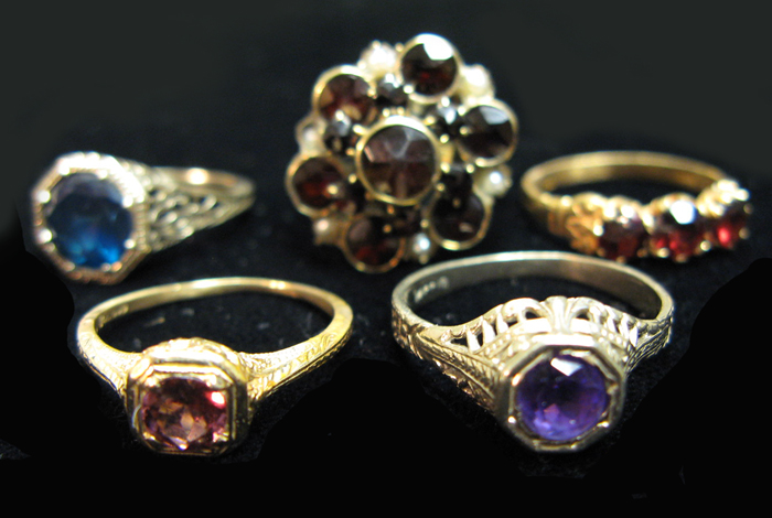 Appraisal: FIVE GEMSTONE AND FOURTEEN KARAT GOLD RINGS three yellow gold