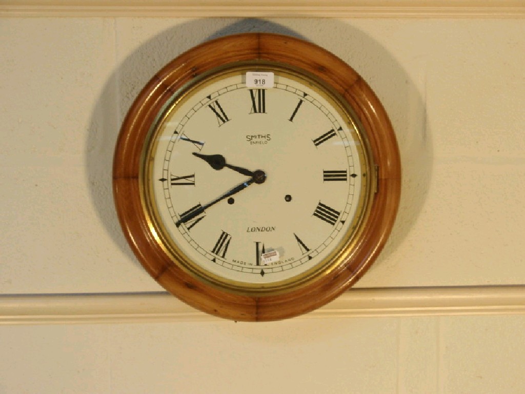 Appraisal: A Smith's Enfield wall clock with white enamel dial and