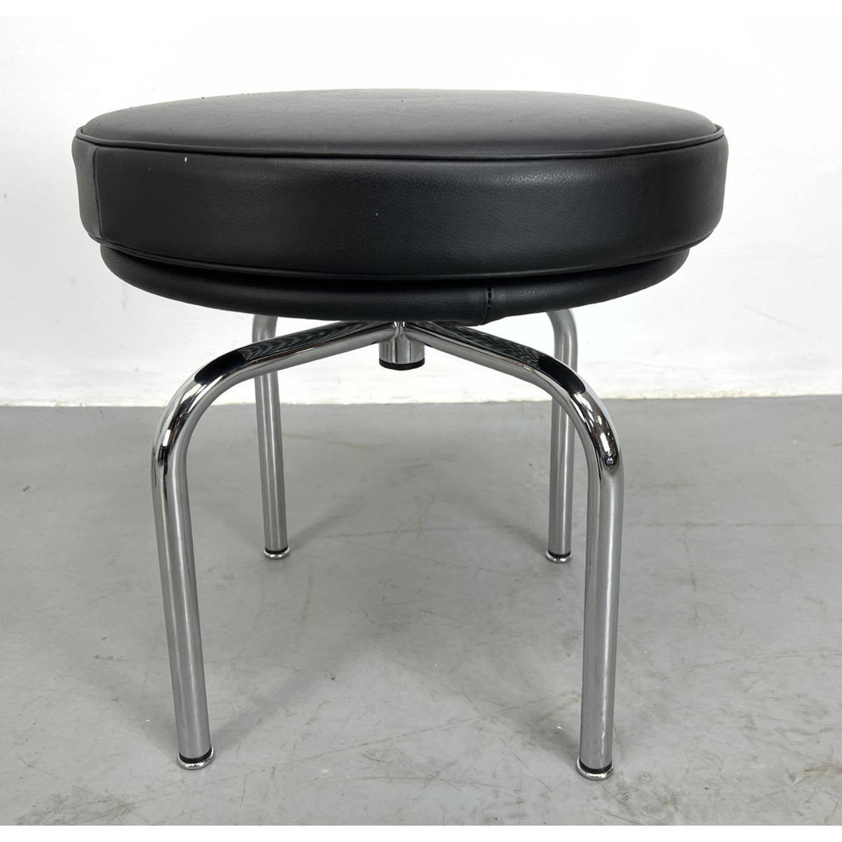 Appraisal: Le Corbusier for Cassina LC leather and chrome stool Signed