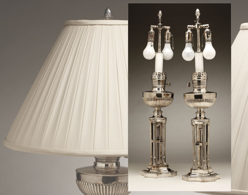 Appraisal: A pair of Regency style silvered oil lamps by Hinks