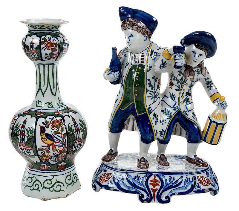 Appraisal: Two Delft Polychrome Objects Dutch figural group of two drinking