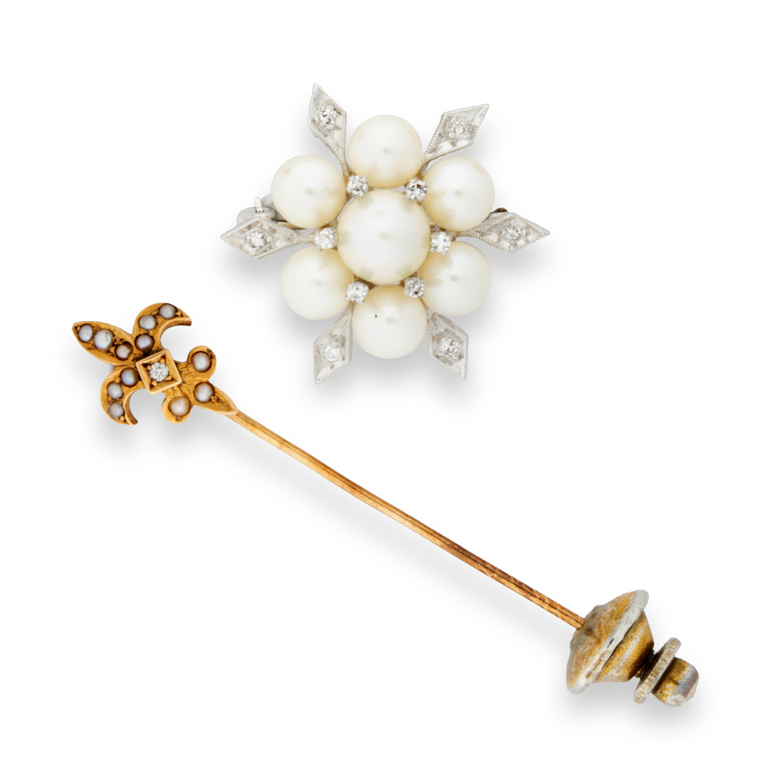 Appraisal: A GROUP OF FOURTEEN KARAT GOLD OR WHITE GOLD BROOCH