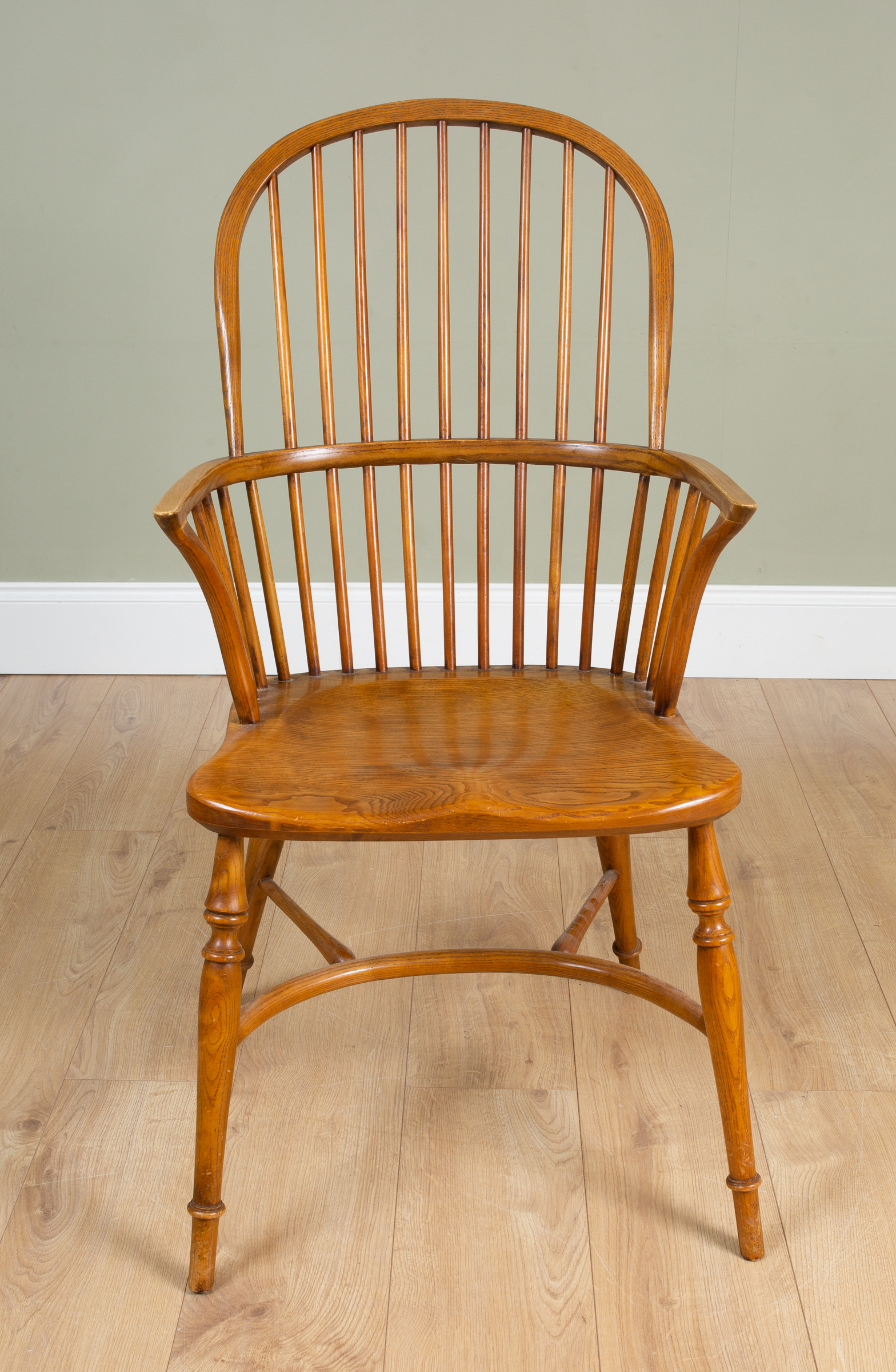 Appraisal: An ash and elm Windsor chair by Stewart Linford the