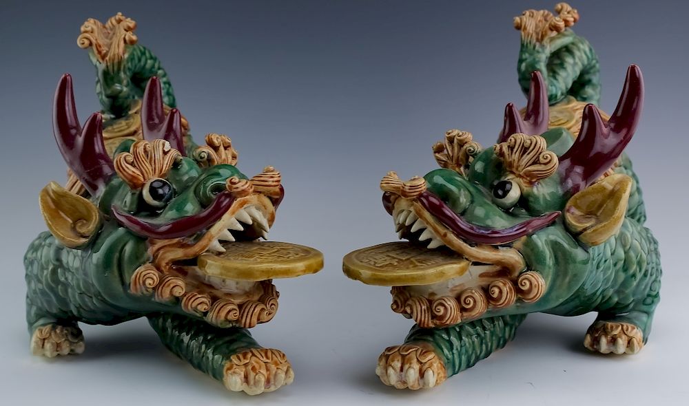 Appraisal: PR Chinese Pottery Art Foo Dogs Prosperity Coins Pair of