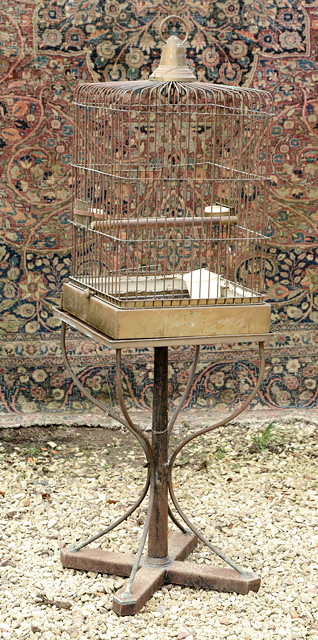 Appraisal: AN OLD BRASS SQUARE SECTION PARROT CAGE with loop suspension