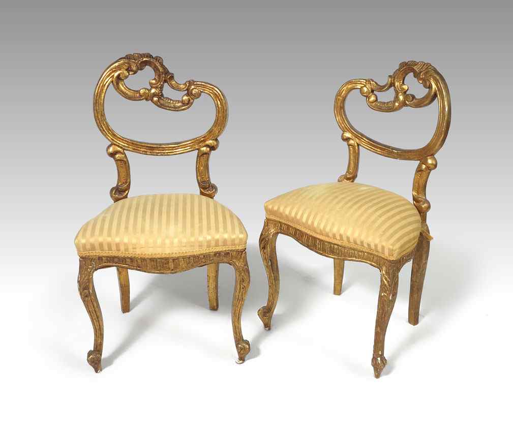 Appraisal: PAIR GOLD GILT ASYMMETRICAL PARLOR CHAIRS Asymmetrical carved and gilt