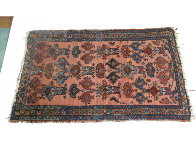 Appraisal: Oriental Area Rug Lilihan ca s rust field with triple