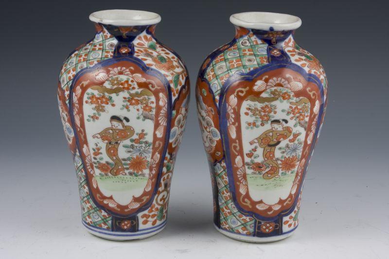 Appraisal: Pair of Imari Baluster Vases late th c reserves depicting