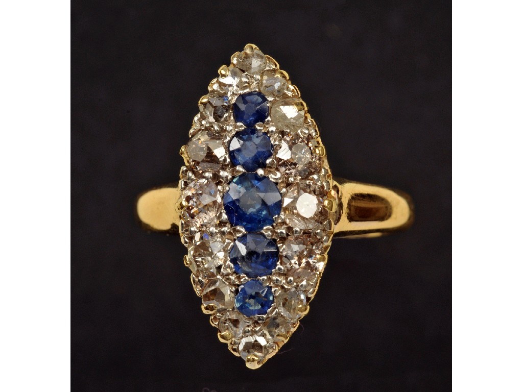 Appraisal: A Sapphire and Diamond Cluster Ring the marquise shaped plaque