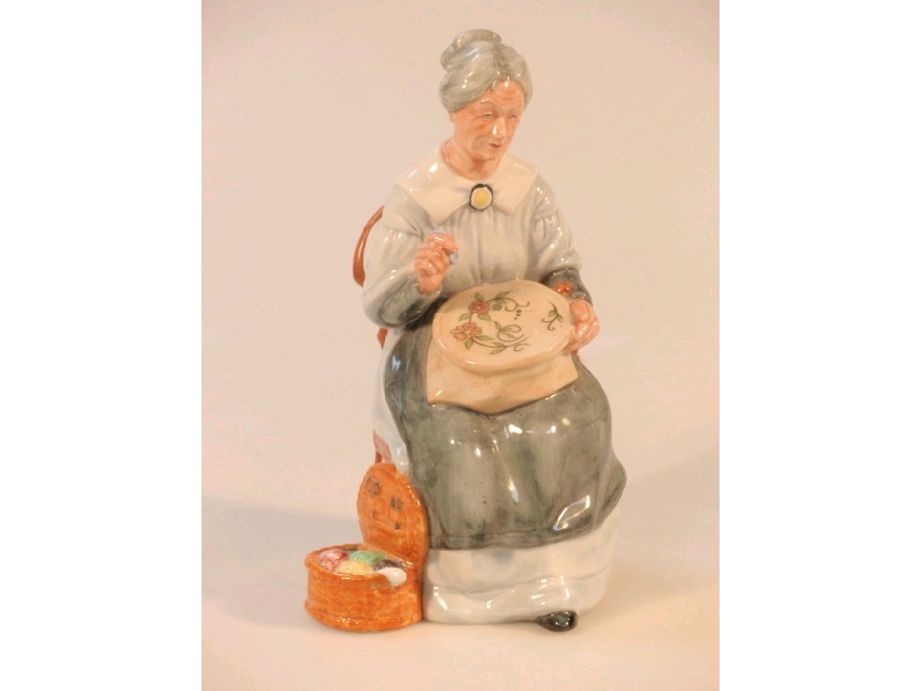 Appraisal: A Royal Doulton figure Embroidering HN