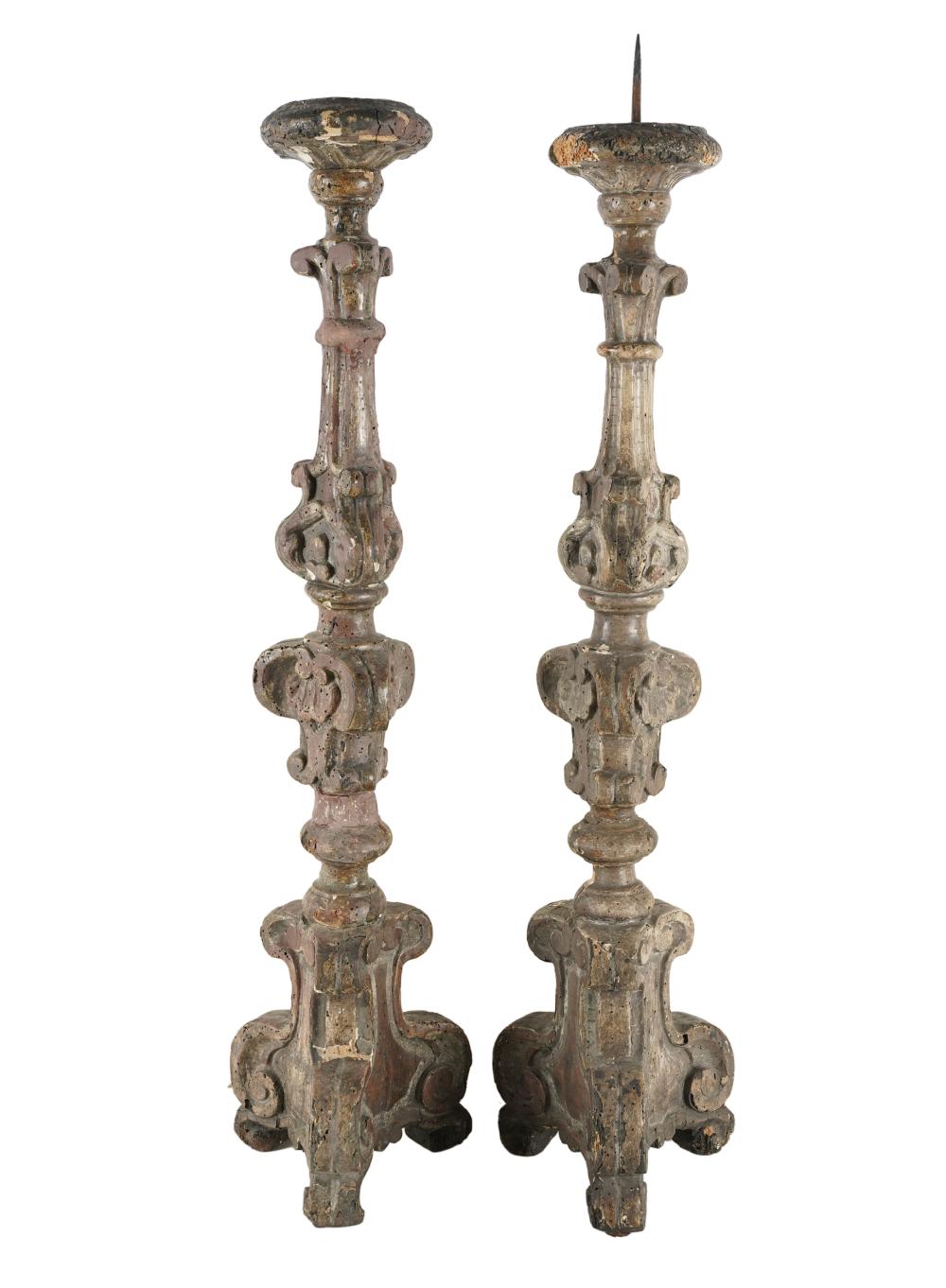 Appraisal: PAIR OF WOOD CARVED ALTAR STICKSCondition with heavy repairs and