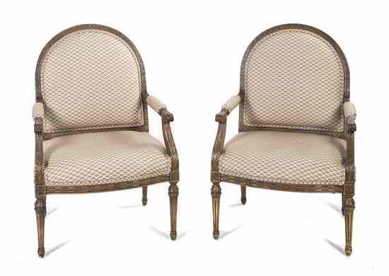 Appraisal: A Pair of Louis XVI Style Walnut Fauteuils each with