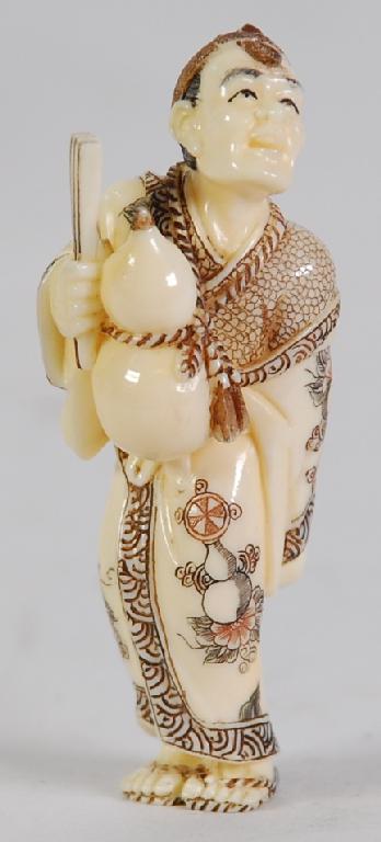 Appraisal: TWENTIETH CENTURY JAPANESE CARVED AND INCISED IVORY NETSUKE of a