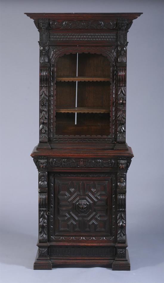 Appraisal: RENAISSANCE REVIVAL CARVED WALNUT CHINA CABINET th century in two