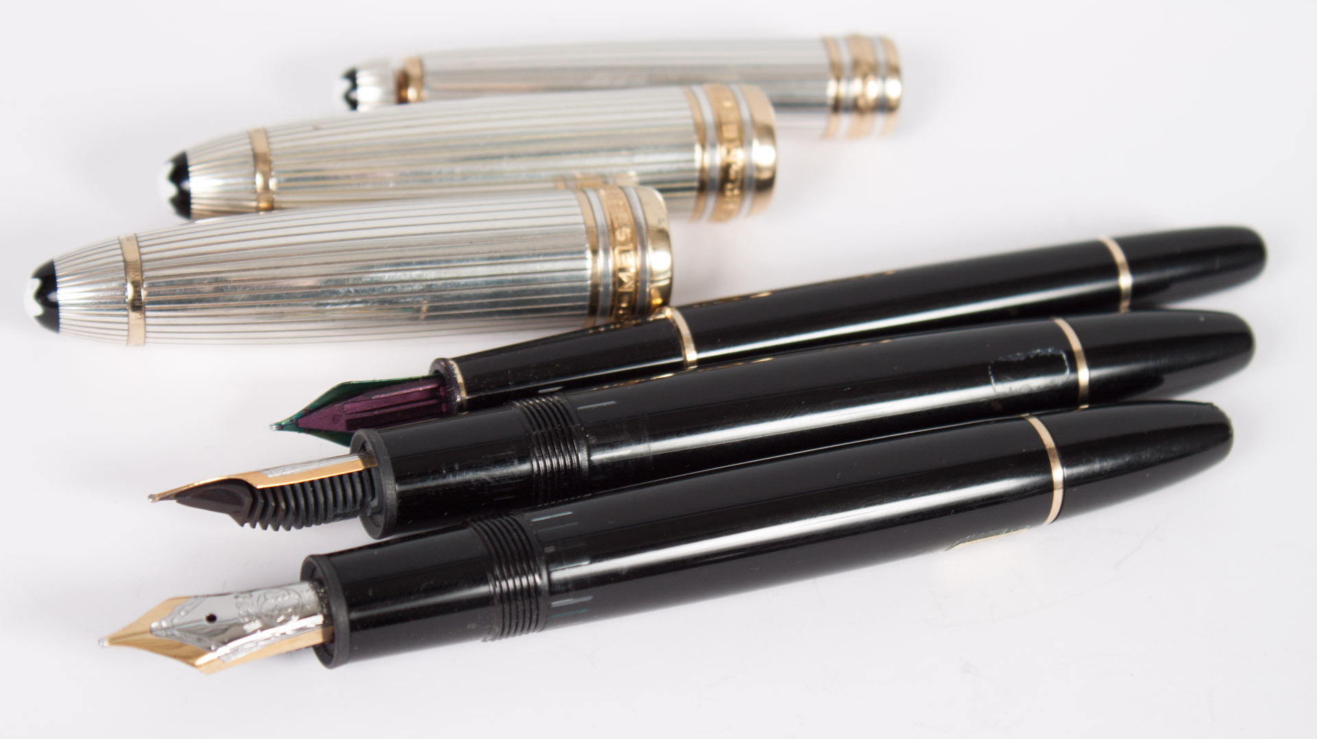 Appraisal: Three Montblanc Meisterstuck fountain pens each with sterling silver cap