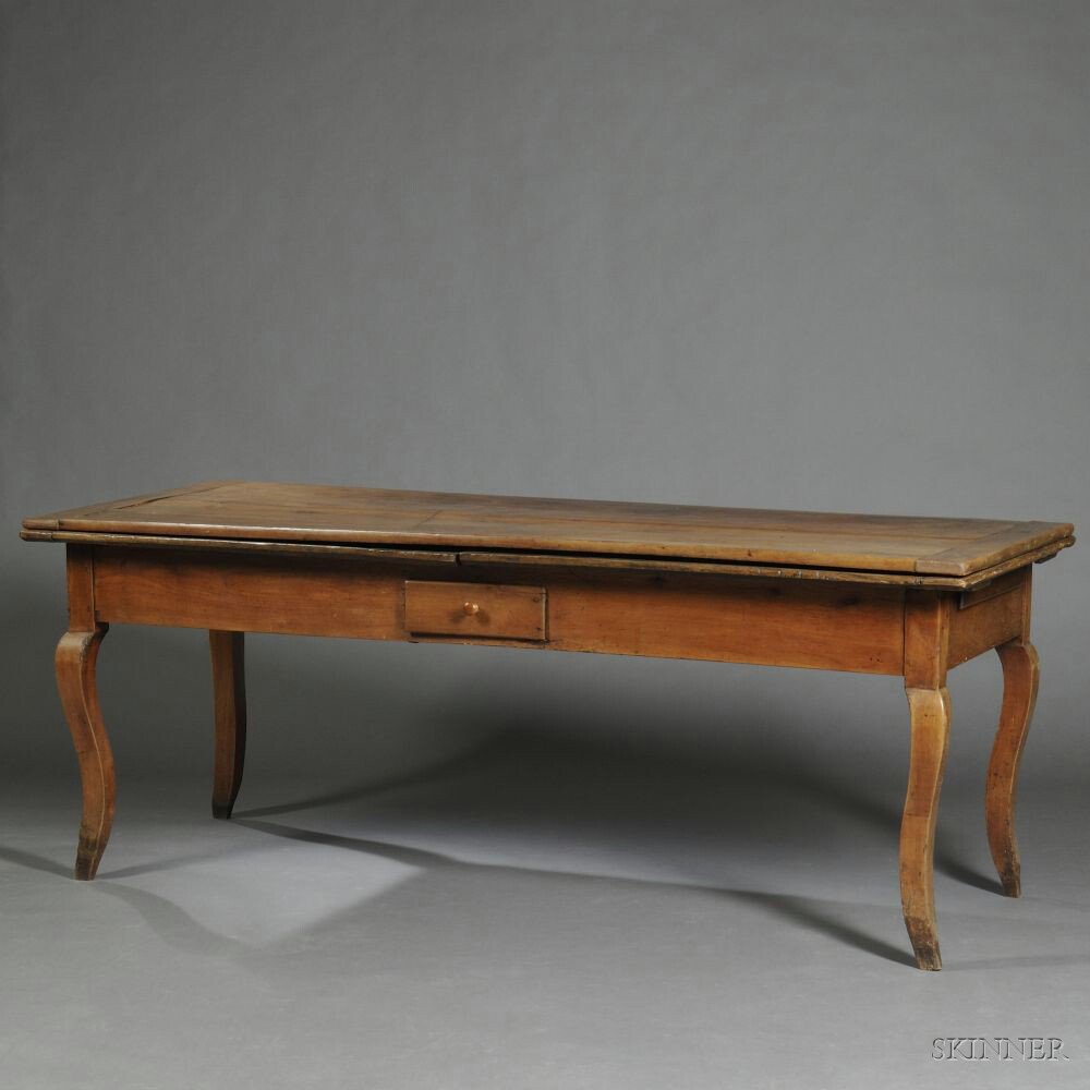 Appraisal: French Provincial Cherry Draw-leaf Table th century with chestnut draw-leaves