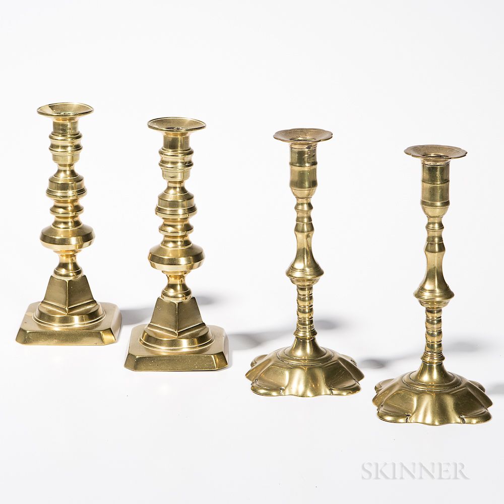 Appraisal: Two Pairs of Brass Candlesticks Two Pairs of Brass Candlesticks