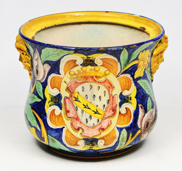 Appraisal: AN OLD MAJOLICA JARDINIERE decorated with Hermes masks foliage and