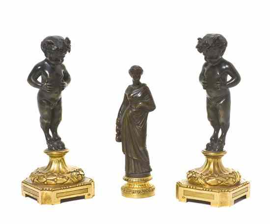 Appraisal: A Pair of Patinated and Parcel Gilt Bronze Figures each