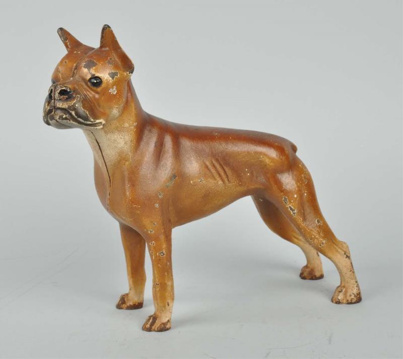 Appraisal: Cast Iron Boxer Dog Doorstop Made by Hubley cat Full-figure