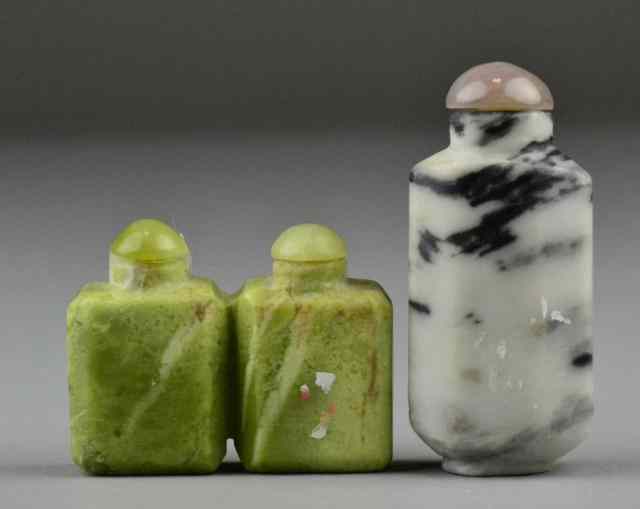 Appraisal: Chinese Carved Jade Snuff BottlesTo include a fastated example the