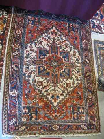 Appraisal: Heriz Persian Handmade Rug elaborate central medallion fine coloring '