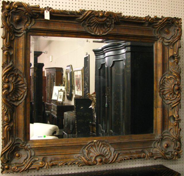 Appraisal: Ornate Antique Style Decorator Wall Mirror with distressed bronzed finish