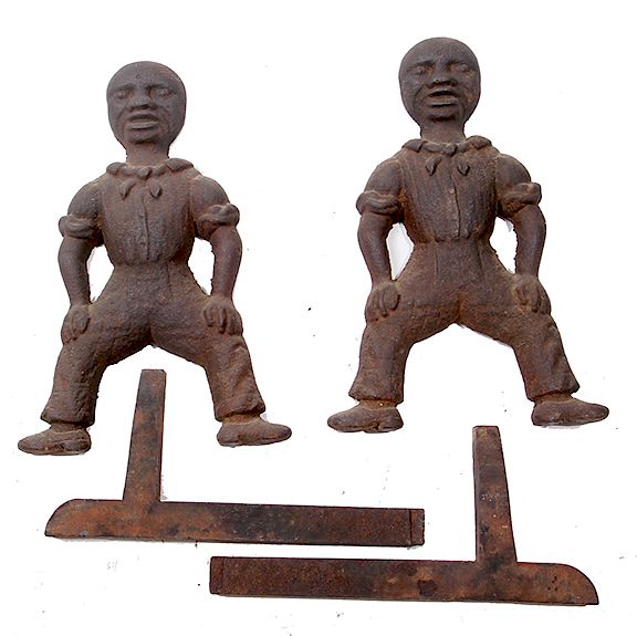 Appraisal: AFRICAN AMERICAN CAST IRON ANDIRONS AFRICAN AMERICAN CAST IRON ANDIRONS