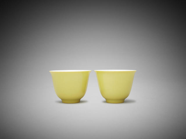 Appraisal: A pair of Chinese yellow glaze wine cups