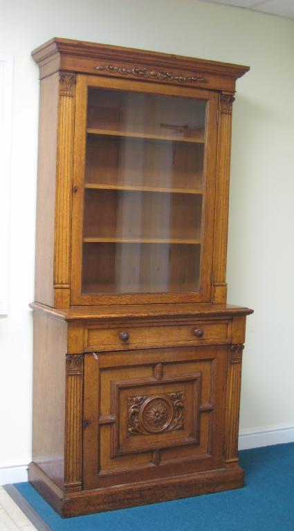 Appraisal: A th Century oak Bookcase the moulded cornice with applied