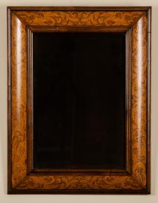 Appraisal: A late th Century walnut cushion-shaped wall mirror with marquetry